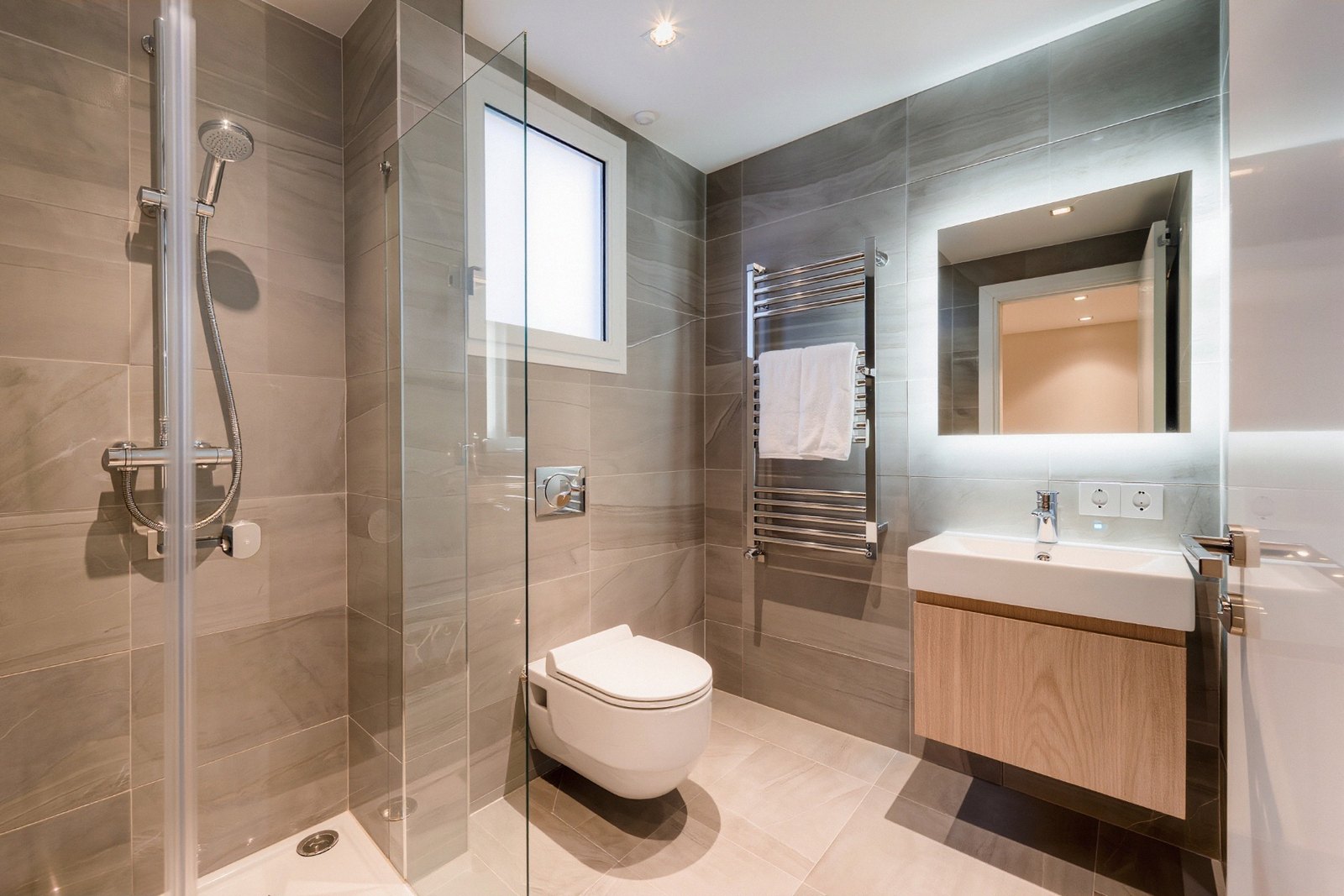 Renovated bathroom with walk-in shower