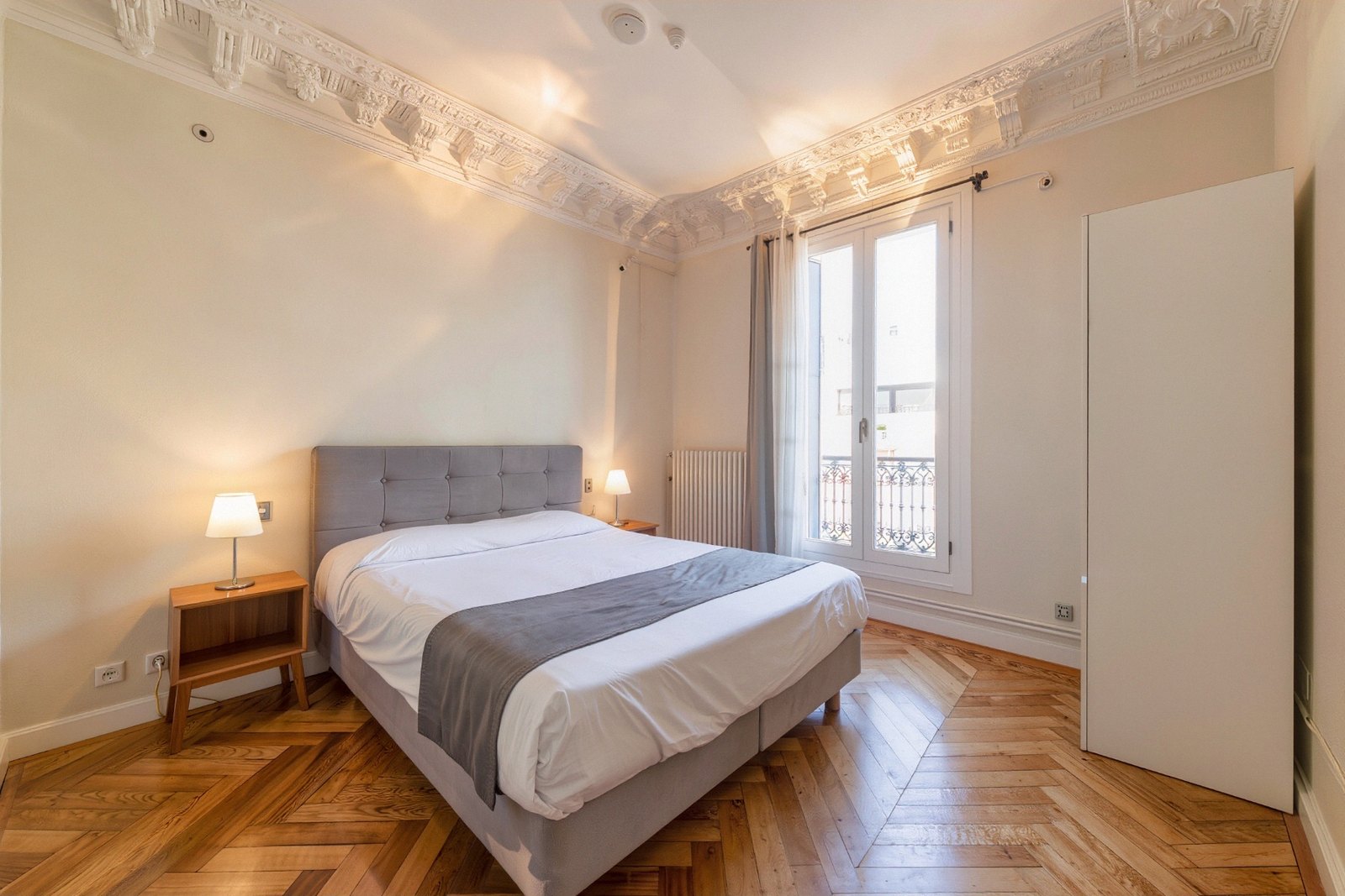Bedroom with French window and balcony